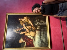 Tess Nalls standing in front of a painting