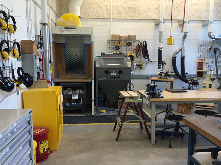 Spray booth, sandblaster, and other equipment in the machine room